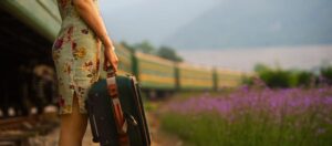 angie strader image of woman with suitcase to run away