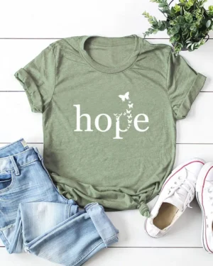 Green short sleeved t-shirt with the graphic printed hope and butterflies