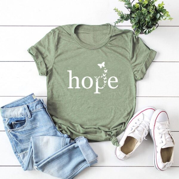 Green short sleeved t-shirt with the graphic printed hope and butterflies